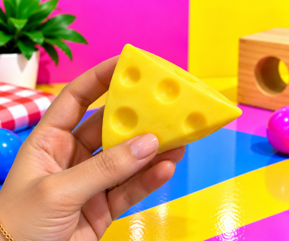 Cheese, shown in hand for size