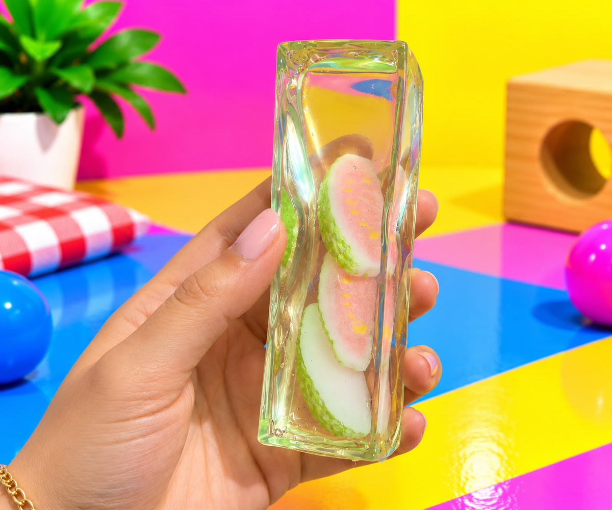 Coconut Oil Cube, shown in hand for size