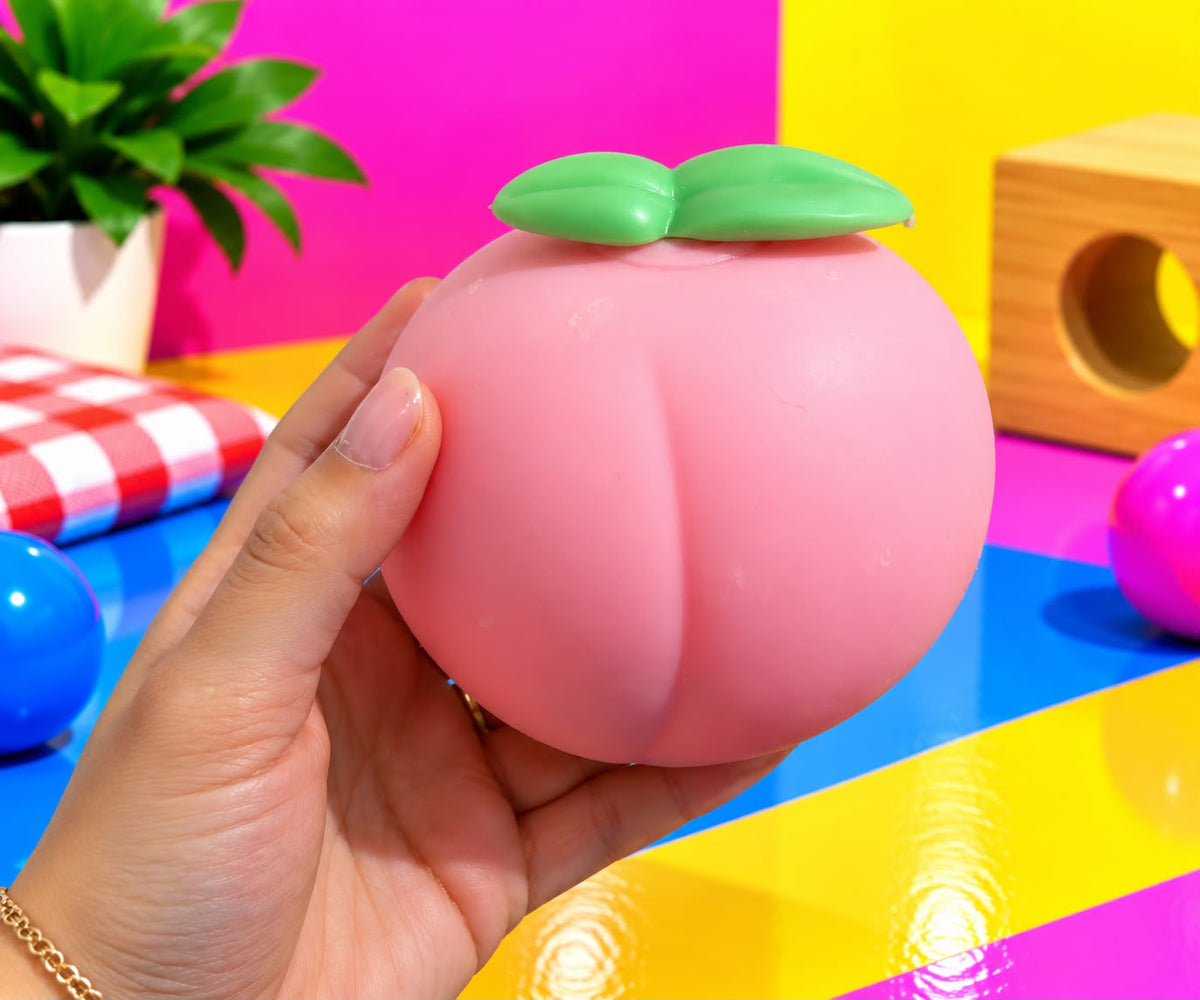Giant Peach Squishy, shown in hand for size
