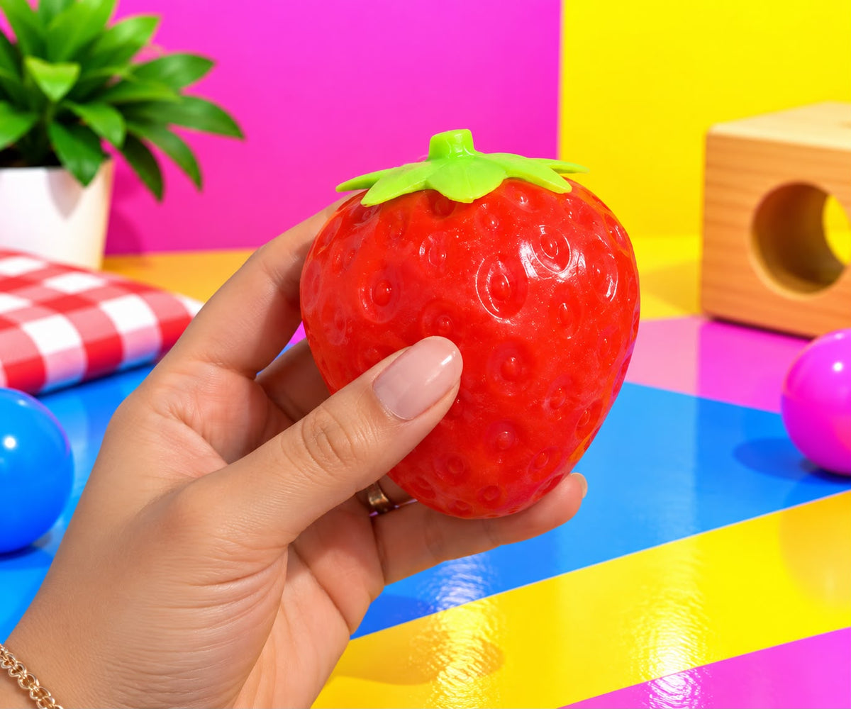 Giant Strawberry Squishy, shown in hand for size